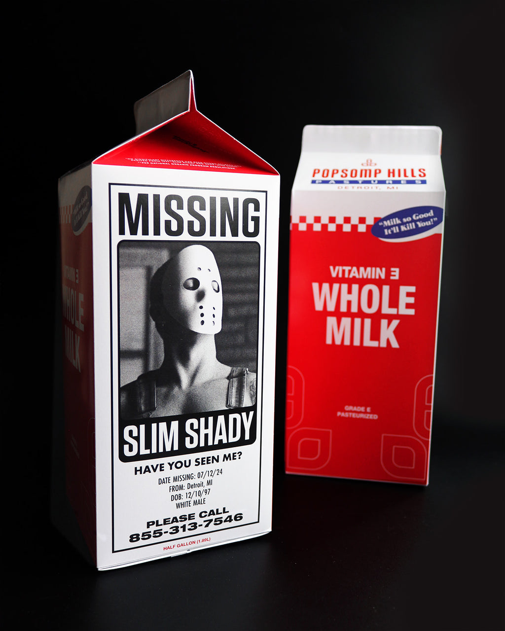 Carton with 'Missing Slim Shady' poster and another milk carton on a black background